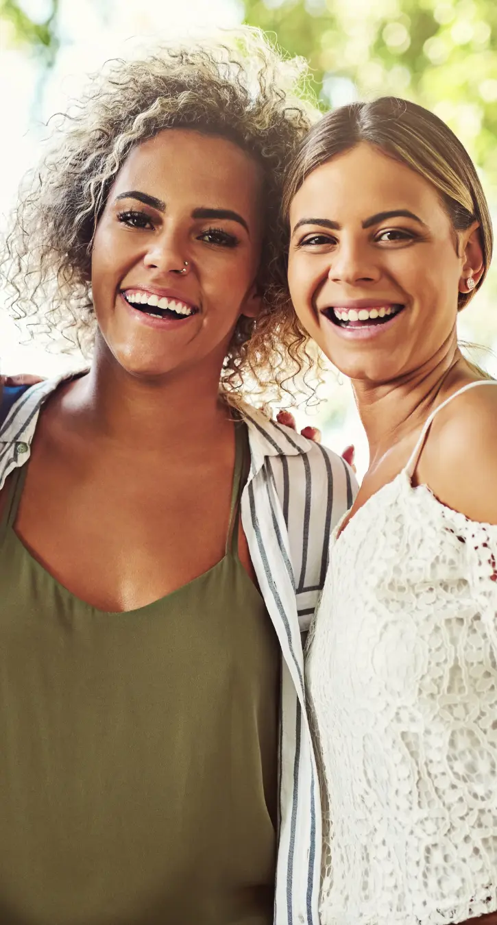 iStock-964162270 Hormone Rebalancing-725 A smiling man carrying a smiling woman on his back
